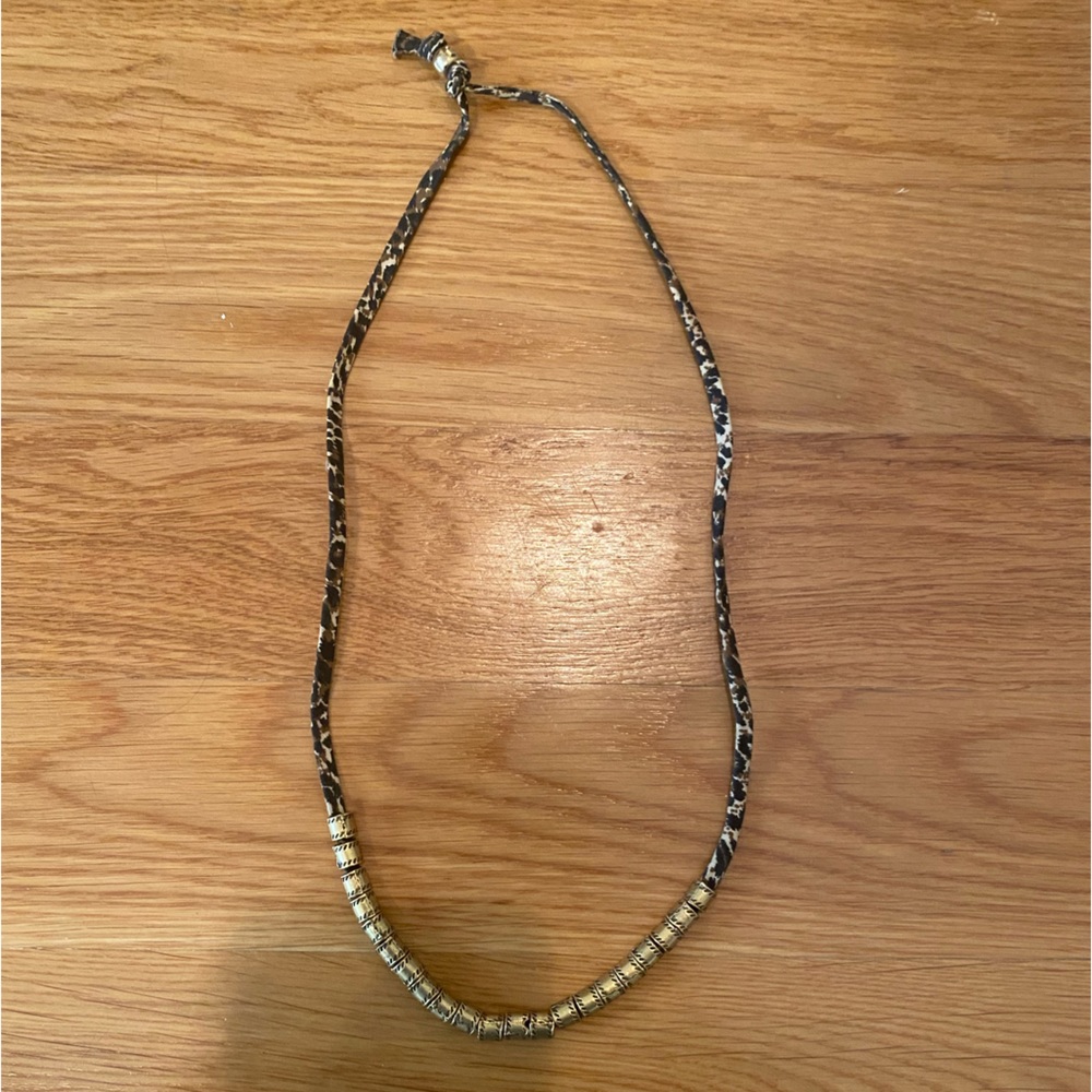 Necklace with cheetah print and gold hardware